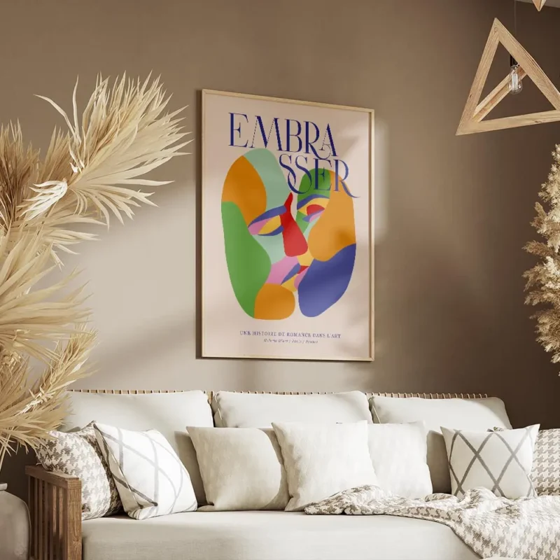affiche coloree montrant deux visages abstraits sembrassant avec le mot embaasse salon.webp