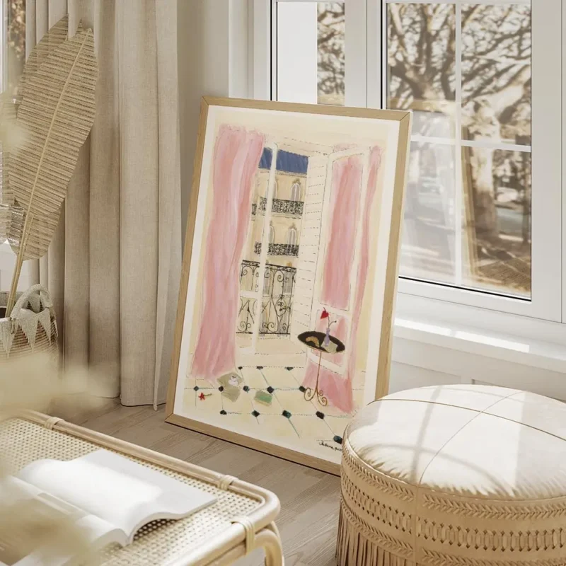 affiche couleur dun balcon parisien avec vue sur la ville rideaux roses livre et salon beige.webp