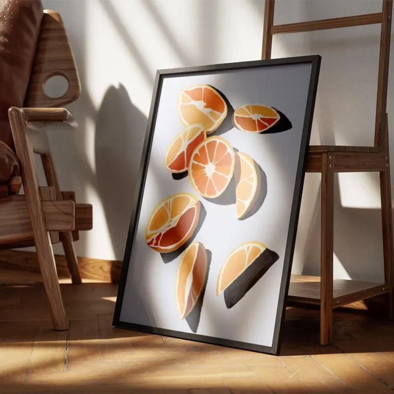 affiche dagrumes oranges et quartiers doranges dans les tons orange et rouge sur encadre.webp
