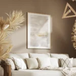 affiche dart abstrait aux tons beiges avec des touches dorees evoquant un paysag salon.webp