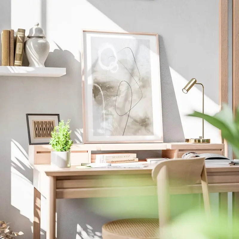 affiche dart abstrait avec des formes et lignes noires et blanches sur fond gris bureau.webp