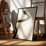 affiche dart abstrait avec des formes texturees noires beiges et blanches et des encadre.webp