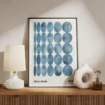 affiche dart abstrait bleu avec des cercles de formes variees et une typographie meuble.webp