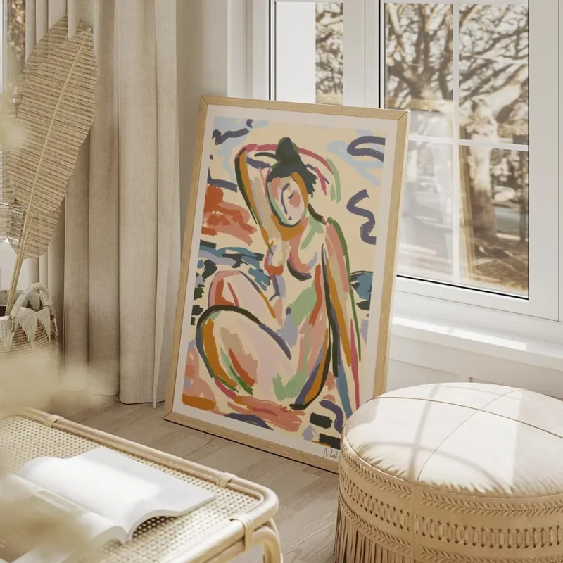 affiche dart abstrait colore dune femme assise au bord de la riviere avec des tr salon beige.webp