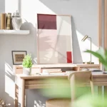 affiche dart abstrait de blocs de couleur rouge rose et beige avec une typograph bureau.webp