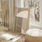 affiche dart abstrait geometrique aux formes courbes et droites dans des tons br salon beige.webp