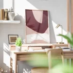 affiche dart abstrait moderne avec des formes asymetriques bordeaux rose clair e bureau.webp