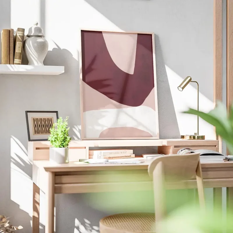 affiche dart abstrait moderne avec des formes asymetriques bordeaux rose clair e bureau.webp
