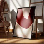 affiche dart abstrait moderne avec des formes asymetriques bordeaux rose clair e encadre.webp