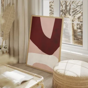 affiche dart abstrait moderne avec des formes asymetriques bordeaux rose clair e salon beige.webp