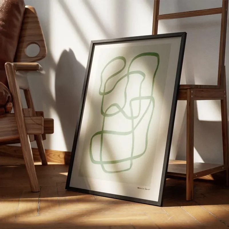 affiche dart abstrait moderne avec des lignes vertes entrelacees sur un fond ver encadre.webp