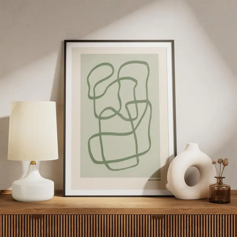 affiche dart abstrait moderne avec des lignes vertes entrelacees sur un fond ver meuble.webp