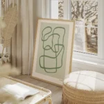 affiche dart abstrait moderne avec des lignes vertes entrelacees sur un fond ver salon beige.webp