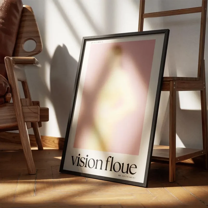 affiche dart contemporain representant une silhouette floue en pastel rose et ja encadre.webp