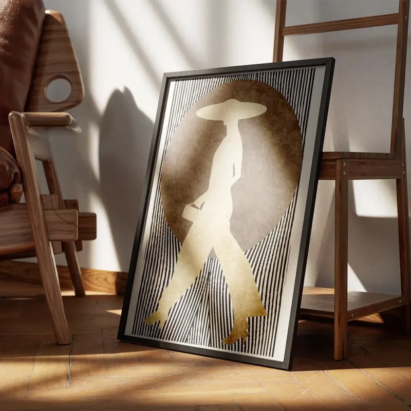 affiche dart graphique silhouette doree dune femme avec chapeau sur fond de pois encadre.webp