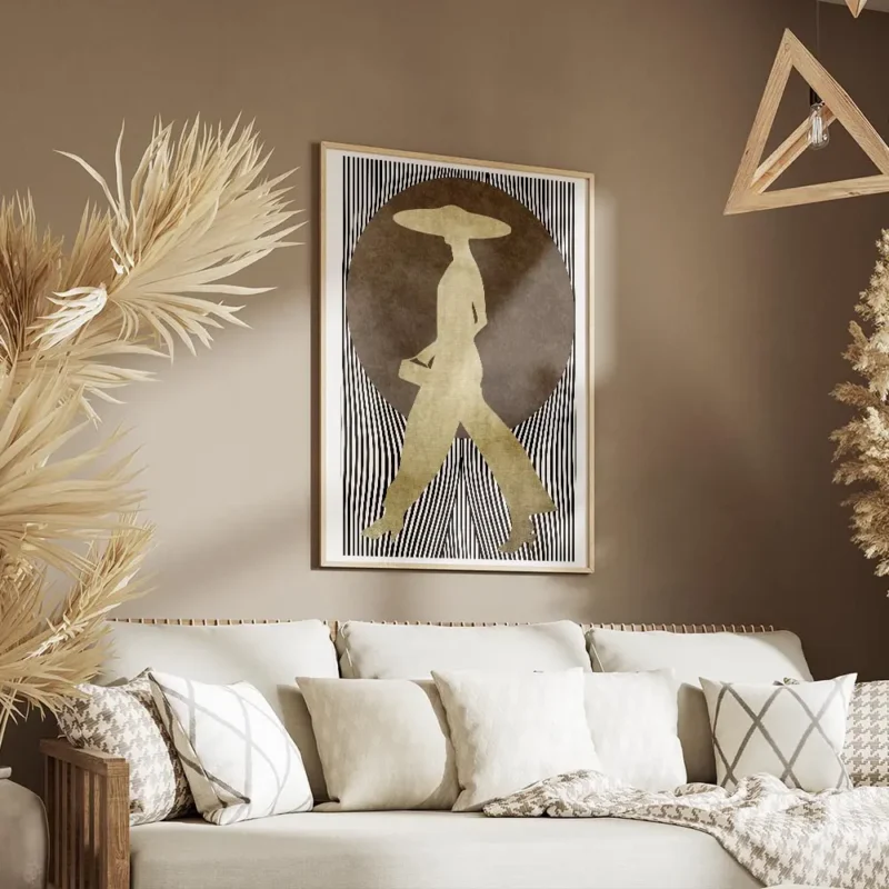 affiche dart graphique silhouette doree dune femme avec chapeau sur fond de pois salon.webp
