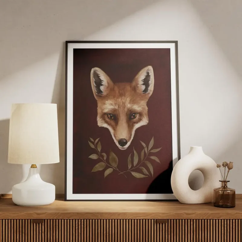 affiche dart renard avec typographie de tete de renard orange et noire sur fond meuble.webp