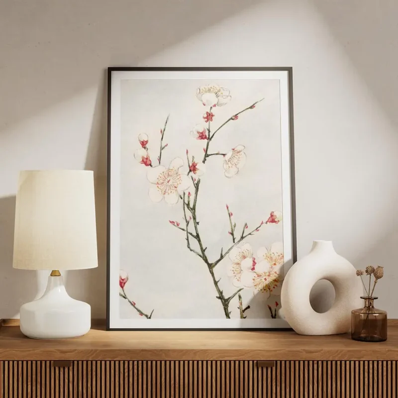 affiche de branches de prunier avec des fleurs blanches et rouges sur fond bleu meuble.webp