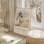 affiche de camille sur la plage de trouville par monet une femme assise tenant u salon beige.webp