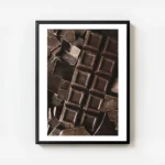 affiche de carres de chocolat noir et de morceaux brises une photographie tentan avec cadre.webp