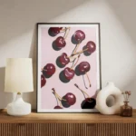 affiche de cerises rouges stylisees avec des ombres sur un fond rose uni dessin meuble.webp