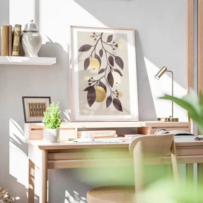 affiche de citrons dores avec des feuilles marron sur fond beige typographie gra bureau.webp