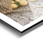 affiche de citrons jaunes dans un sac en filet sur un sol en pierre avec la mer aluminium.webp