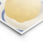 affiche de citrons jaunes sur une nappe a carreaux beige avec un citron sur une lightpanel.webp