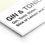 affiche de cocktail gin tonic avec blocs de couleurs verte jaune grise et texte lightpanel.webp