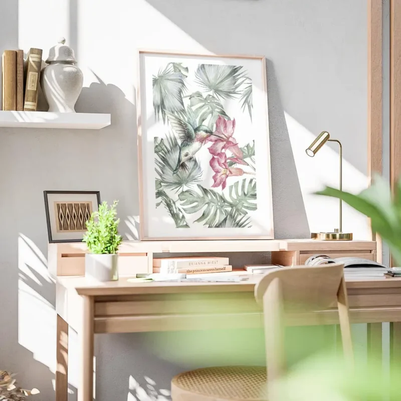 affiche de colibri turquoise et rose butinant des fleurs tropicales entoure de f bureau.webp