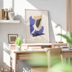 affiche de collage avec formes geometriques angulaires superposees en orange noi bureau.webp