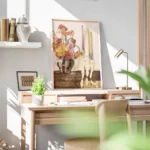 affiche de coquelicots colores dans un vase raye avec des bougies et rubans sur bureau.webp