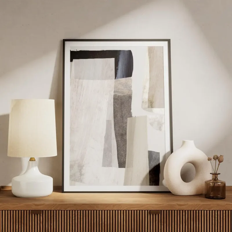affiche de dan hobday formes abstraites beiges et noires superposition de couleu meuble.webp