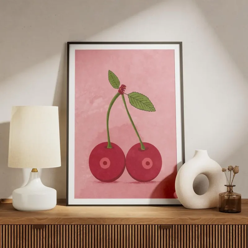 affiche de deux cerises rouges avec des queues vertes et des feuilles sur fond r meuble.webp