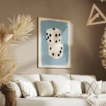 affiche de deux des blancs empiles avec des points noirs sur un fond bleu clair salon.webp