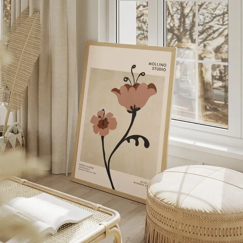 affiche de deux fleurs graphiques marron et roses avec des details noirs et du t salon beige.webp