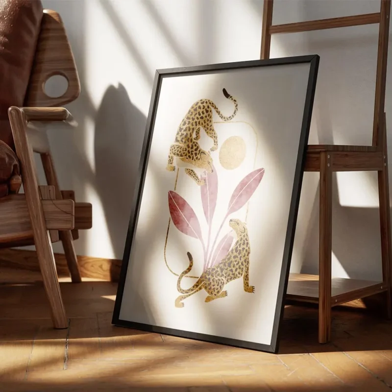 affiche de deux leopards dores tachetes noirs avec des feuilles bordeaux et un c encadre.webp