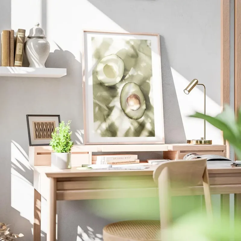 affiche de deux moities davocat sur papier vert avec des ombres creant des motif bureau.webp