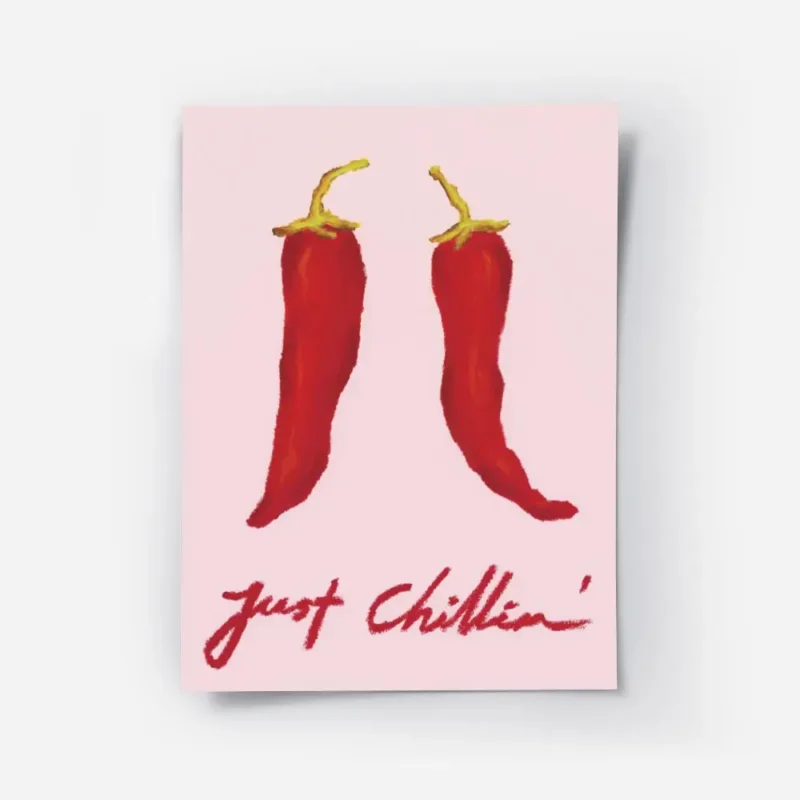 affiche de deux piments rouges sur fond rose avec le texte just chillin en typog.webp