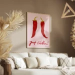 affiche de deux piments rouges sur fond rose avec le texte just chillin en typog salon.webp