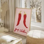 affiche de deux piments rouges sur fond rose avec le texte just chillin en typog salon beige.webp