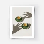 affiche de deux tasses de cafe vert sur soucoupes avec des ombres de mains sur l.webp
