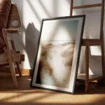 affiche de dunes de sable avec herbe de plage et ocean calme au coucher du solei encadre.webp