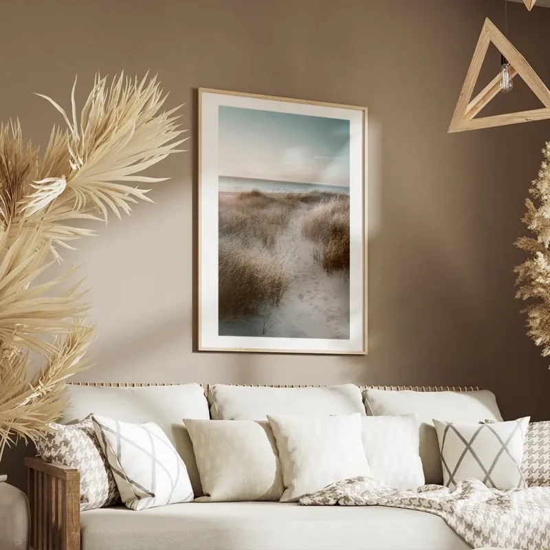 affiche de dunes de sable avec herbe de plage et ocean calme au coucher du solei salon.webp