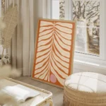 affiche de feuille beige abstraite avec un cercle rose sur fond orange rouille t salon beige.webp