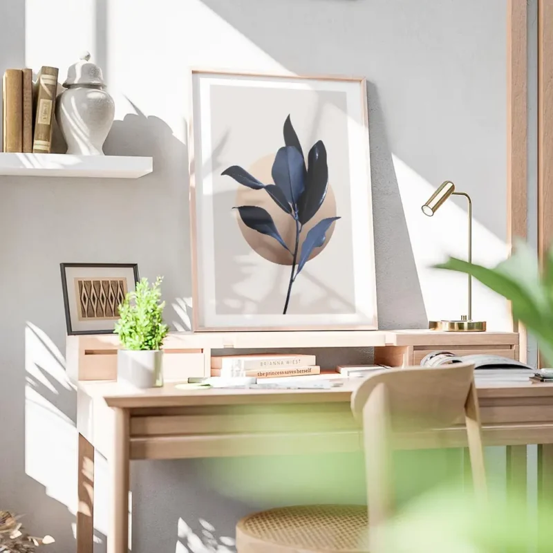 affiche de feuilles de magnolia bleu fonce avec un cercle illustre graphique sur bureau.webp