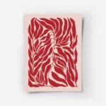 affiche de feuilles rouges sur fond rose motif graphique.webp