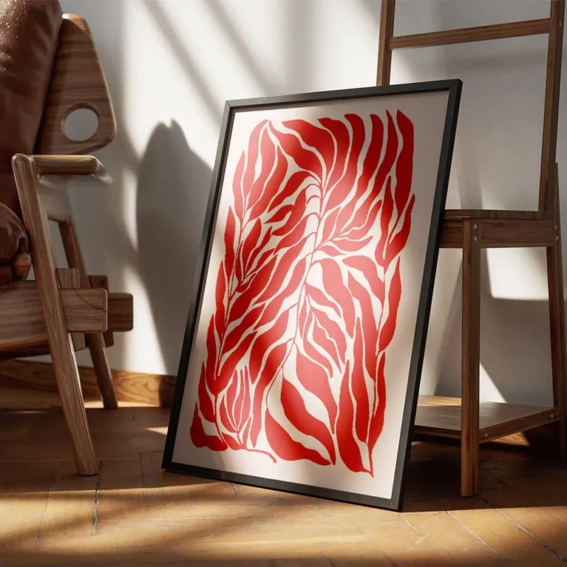 affiche de feuilles rouges sur fond rose motif graphique encadre.webp