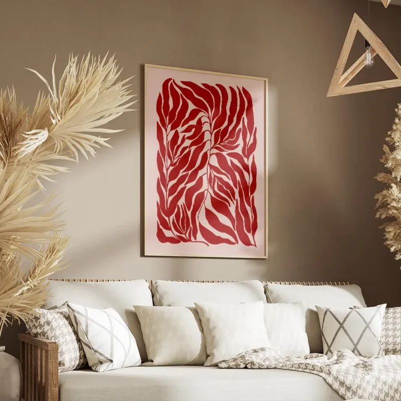 affiche de feuilles rouges sur fond rose motif graphique salon.webp