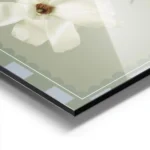 affiche de fleurs blanches sur fond vert doux aux petales delicats et a la typog aluminium.webp